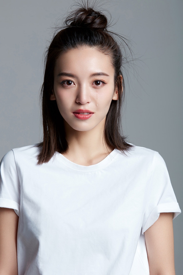 大眼女星尤靖茹清新写真手机壁纸下载