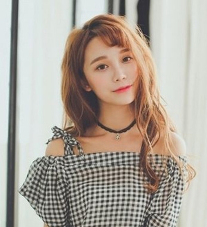 斜刘海圆脸发型图片女