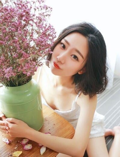 潮流时尚的圆脸发型设计