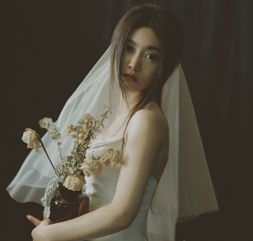 有刘海的新娘发型图片，展现十足的女人味