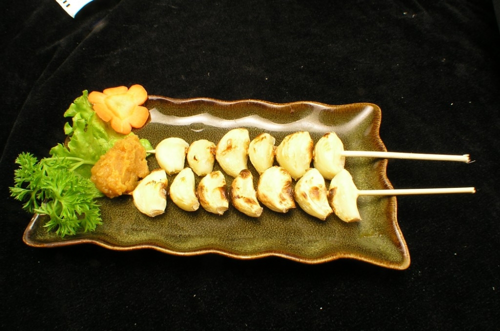 汁烤大蒜日式韩式美食素材图片