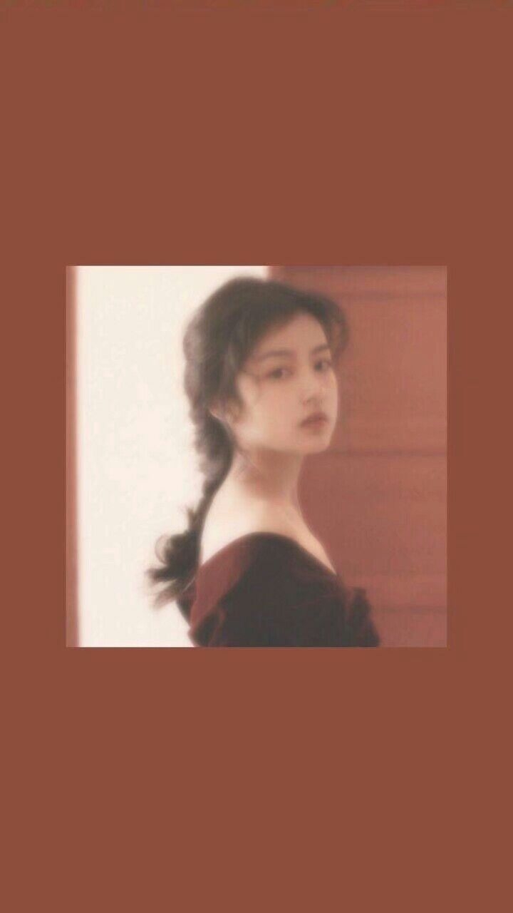 红色少女风带字手机壁纸图片